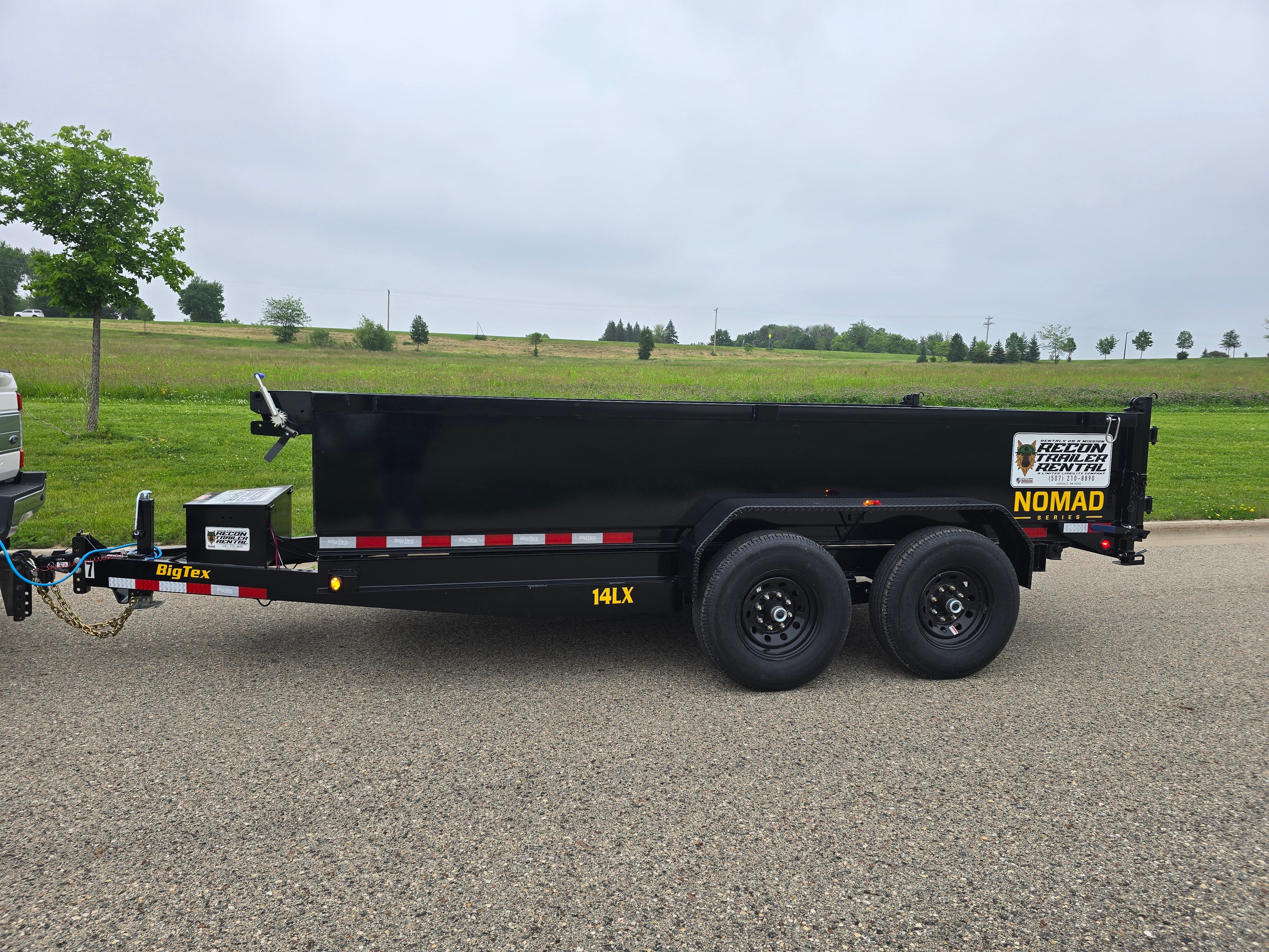 BigTex 14' dump trailer rental - heavy-duty hydraulic dump trailer for landscaping and construction in Lonsdale, MN