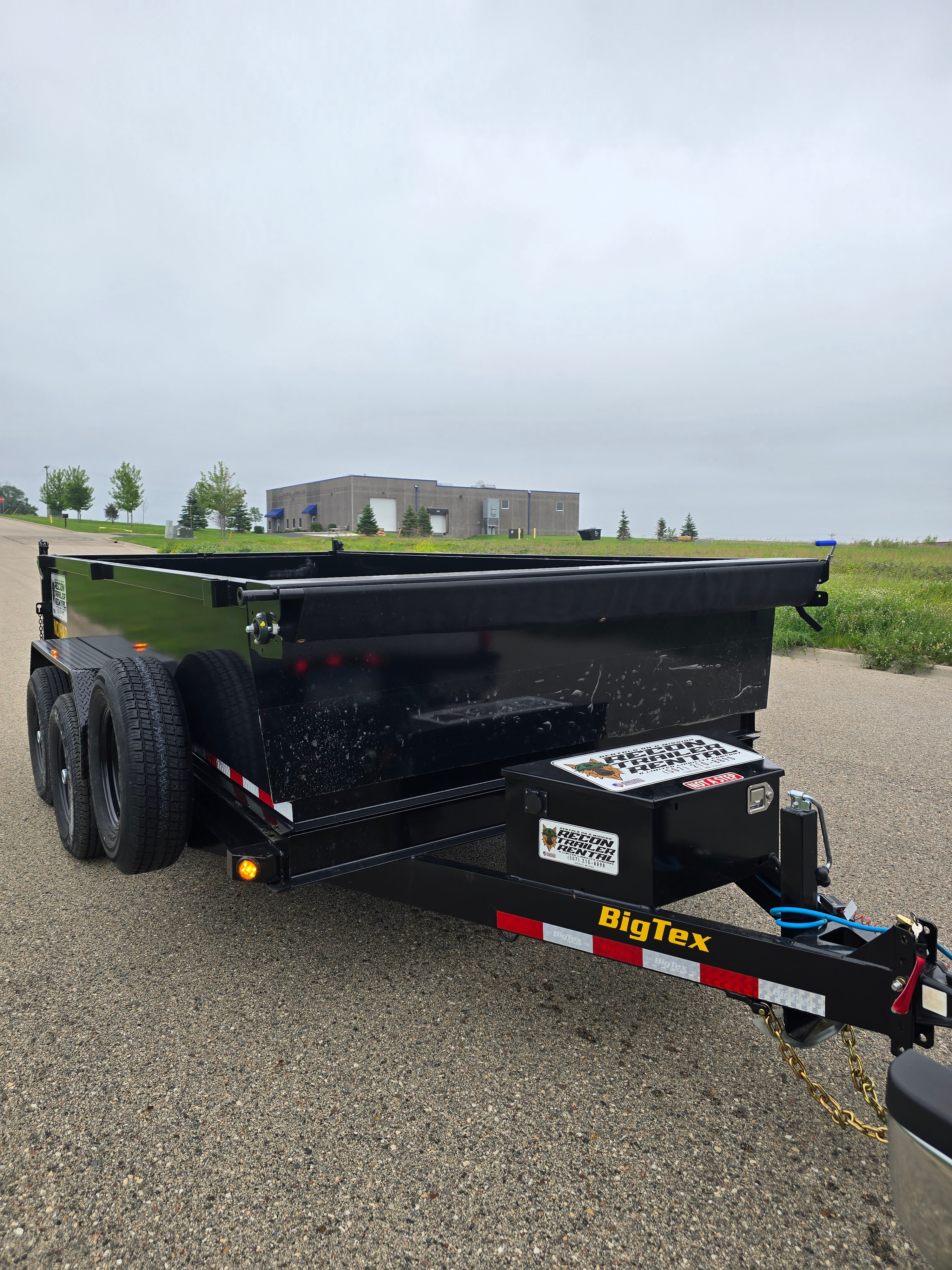 BigTex dump trailer side angle with dual axle configuration