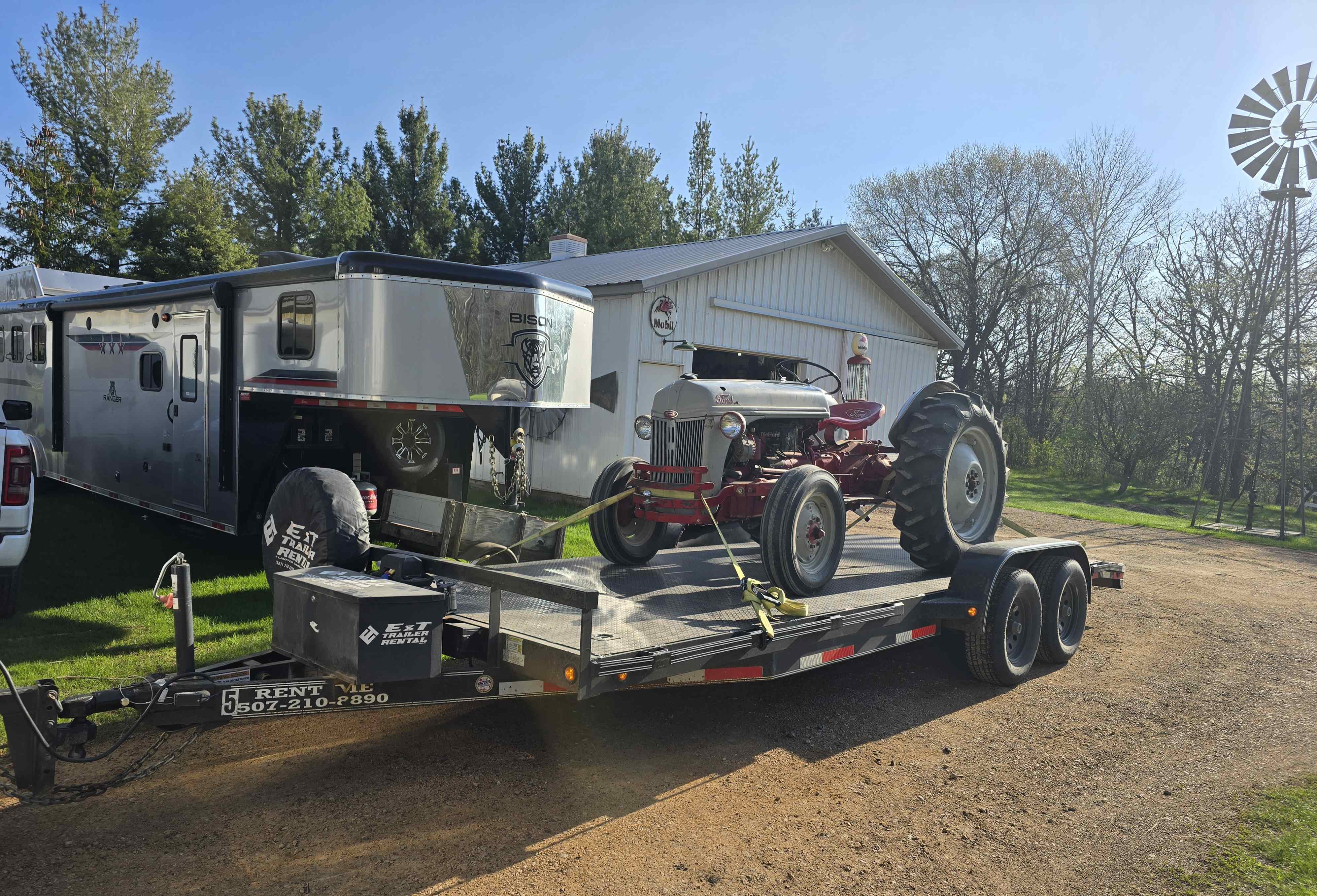East Texas 12K car trailer loaded with vintage tractor