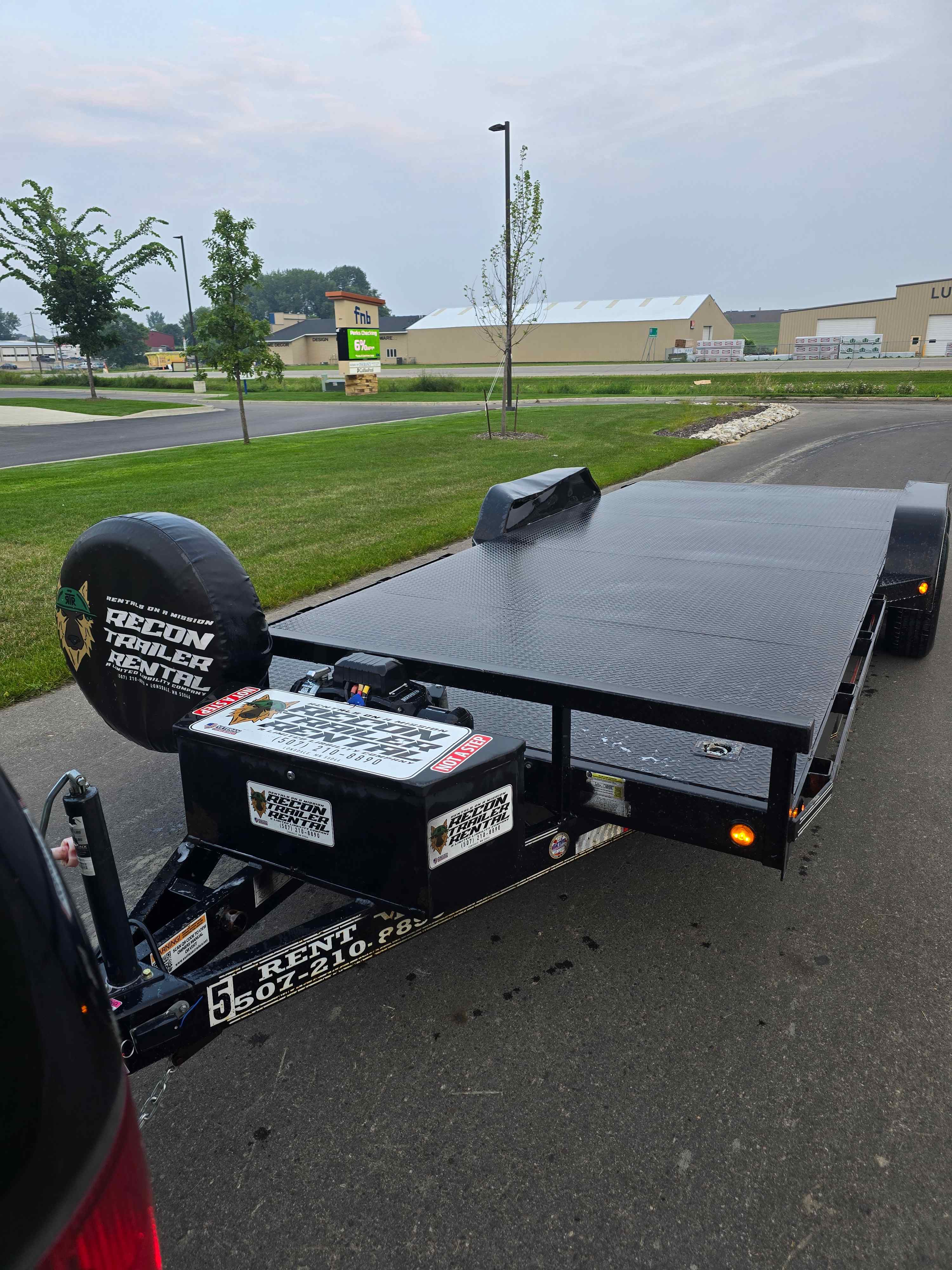 East Texas 12K car trailer empty deck with diamond plate flooring