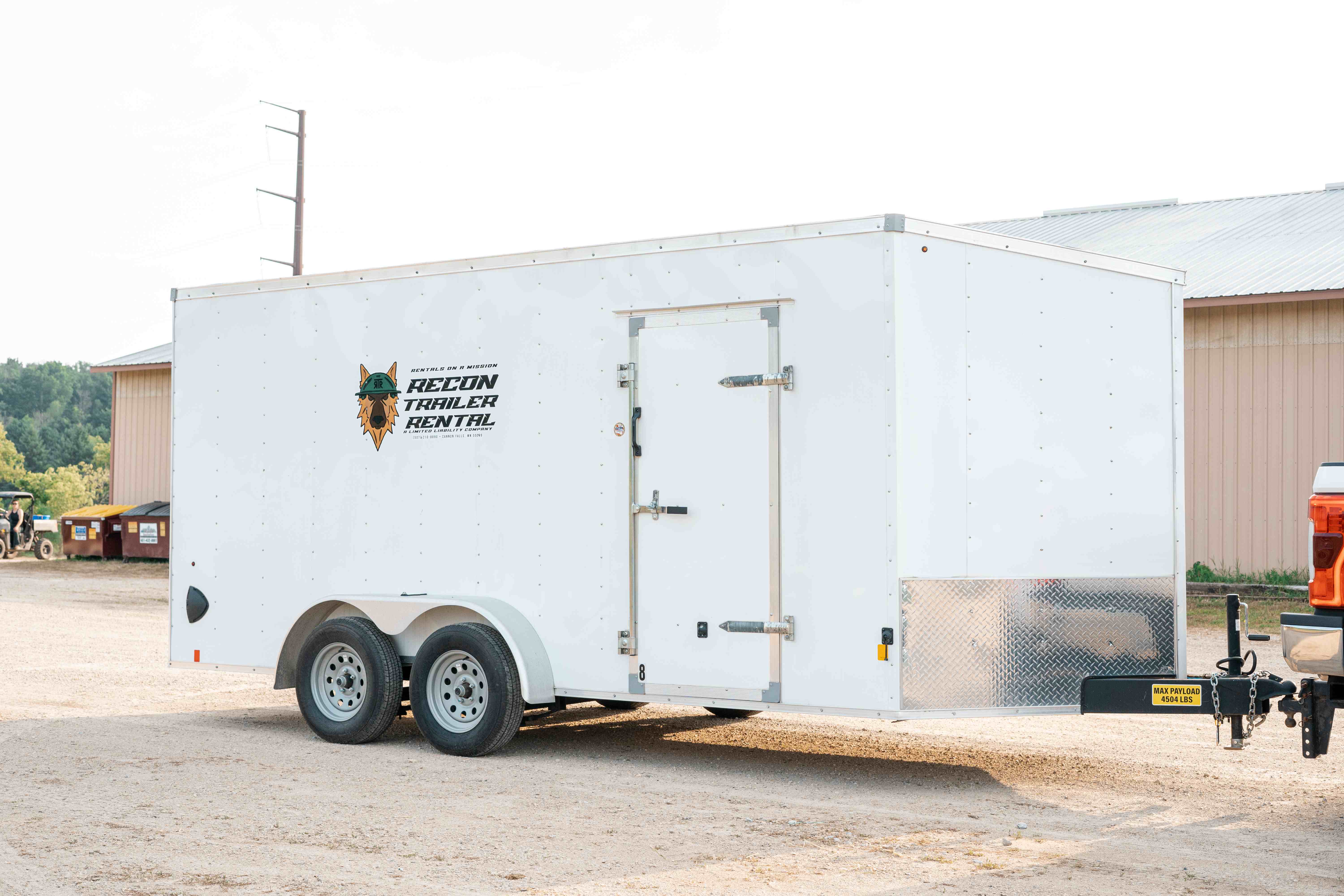 7x16 enclosed trailer exterior side and wheel view