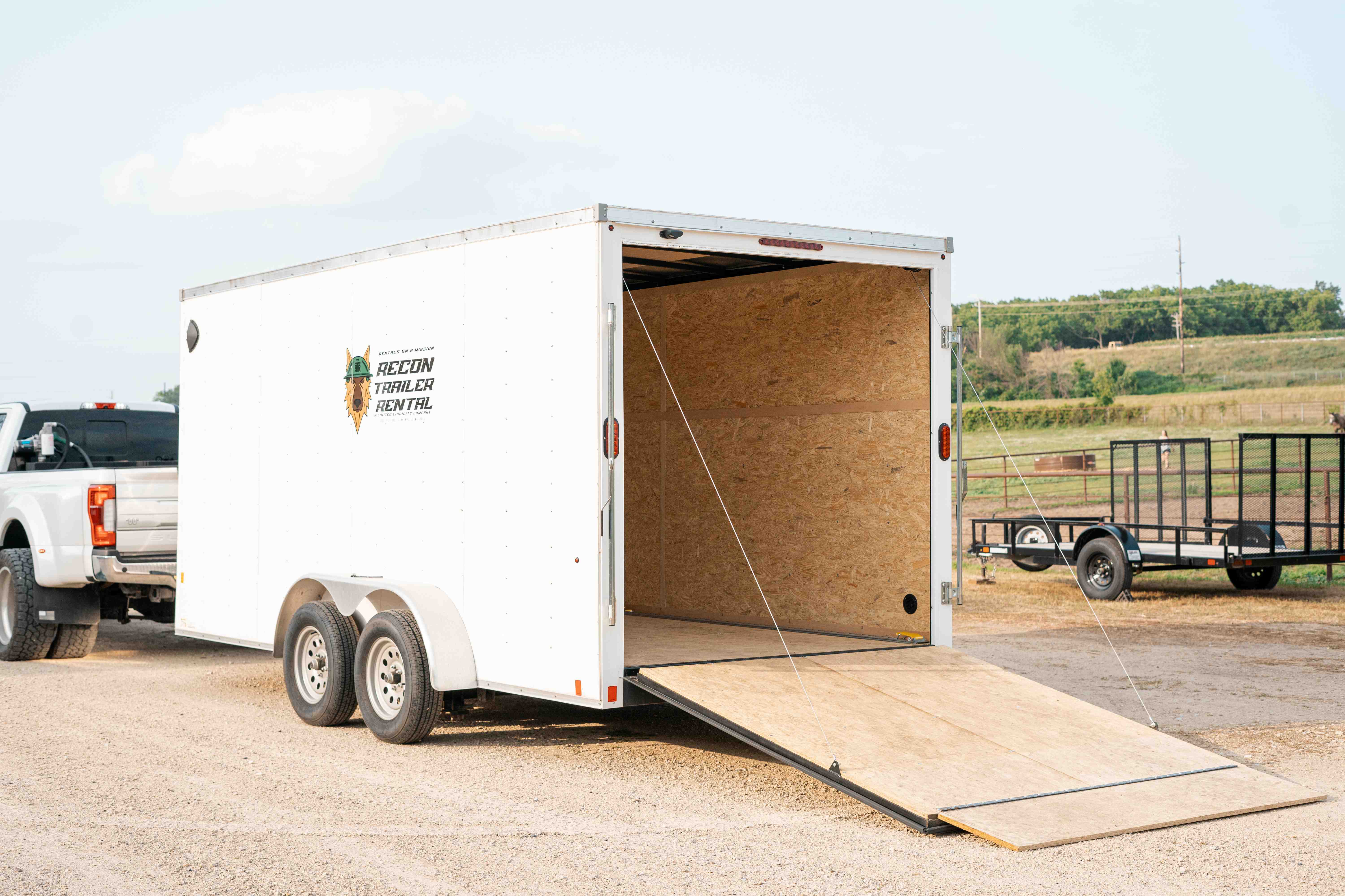 7x16 enclosed trailer exterior with open rear doors